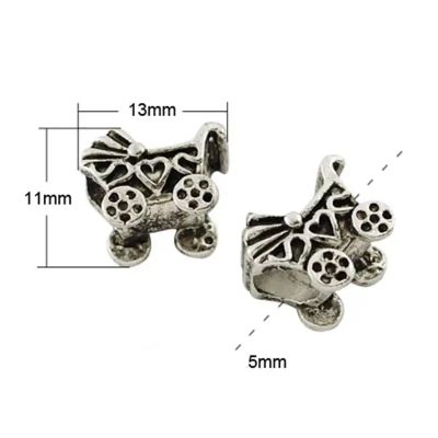 Метално мънисто във формата на бебешка количка, цвят антично сребро с размери 13х11 мм